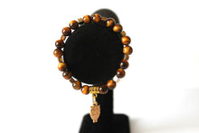 Load image into Gallery viewer, GENUINE Natural Stones/Healing Crystals, hand-crafted bracelets (Tiger Eye and Black Obsidian). Adorned with silver or gold charms