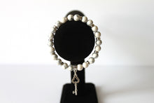 Load image into Gallery viewer, Key 7.5" GENUINE Natural Stones/Healing Crystals, hand-crafted bracelets (White Howlite). All bracelets are adorned with silver or gold charms. BGWB13-5