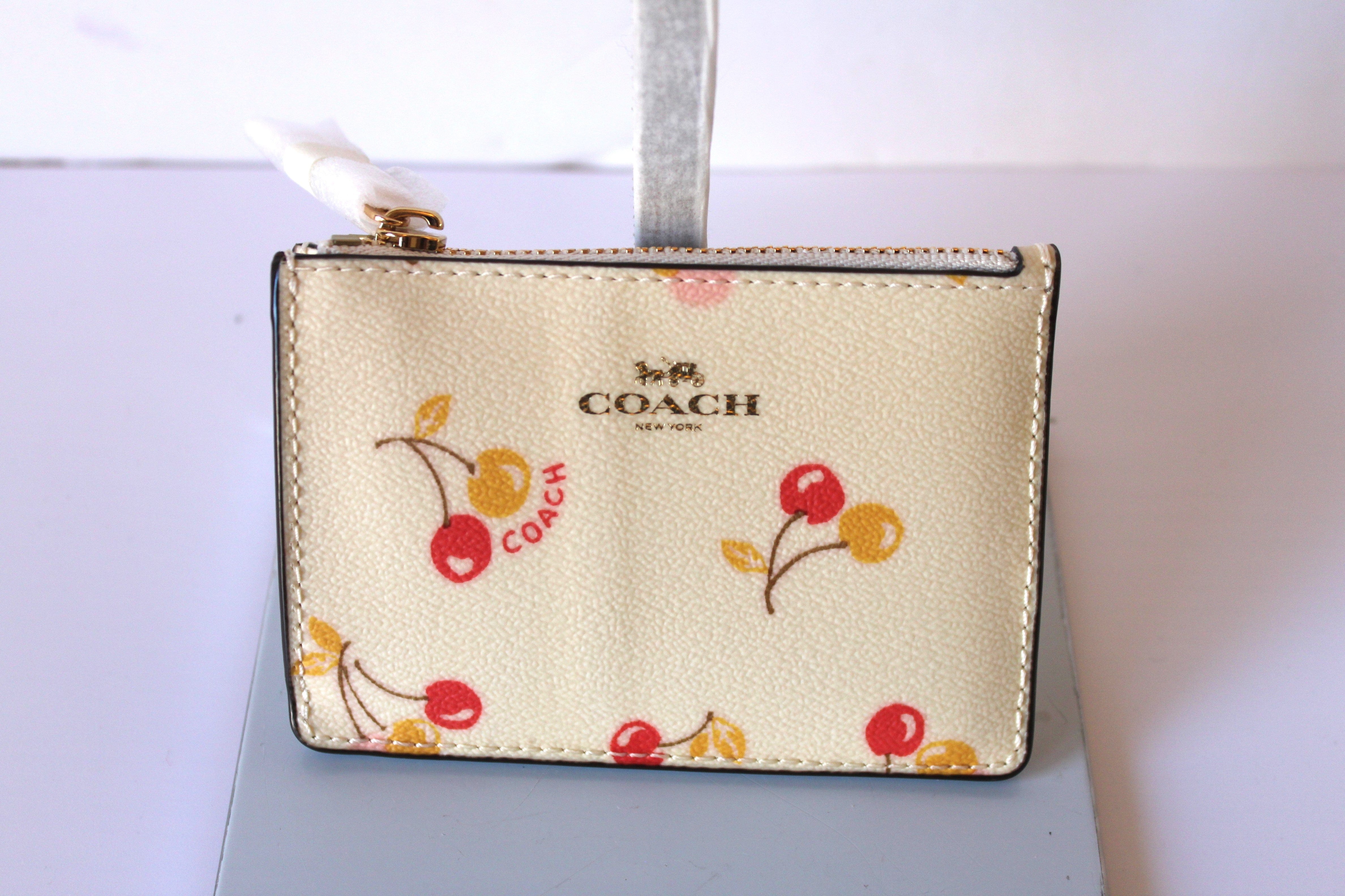 Handbags- Coach Leather wallet/keychain - Cream w/pink and yellow cher –  J's Classic Finds