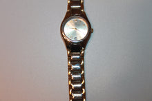 Load image into Gallery viewer, Watch (Anne Klein) - 6.5" Women's Gold/Silver two-tone watch from Anne Klein with silver face JL029
