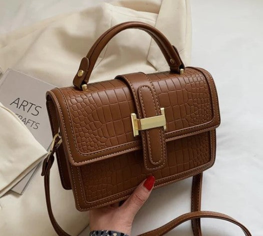 The Timeless Allure of Designer Bags: A Fashionable Journey