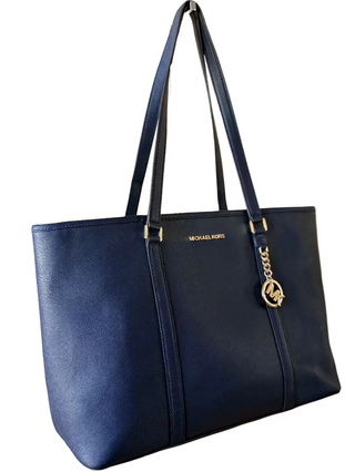 Blue tote bag with a gold logo 