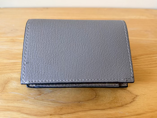 Wallet accordian style design to hold many credit cards - light brown with gold hardware