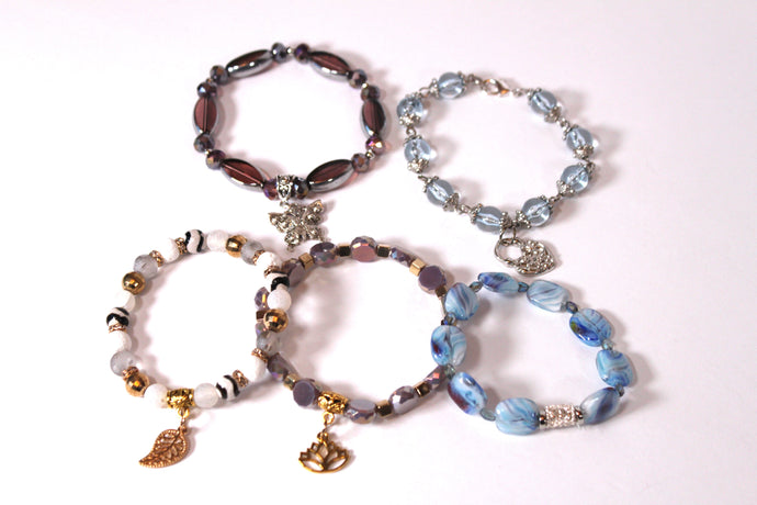 Czech Crystals/Glass hand-crafted bracelets (Multiple styles/color options available). Bracelets adorned with silver or gold charms.