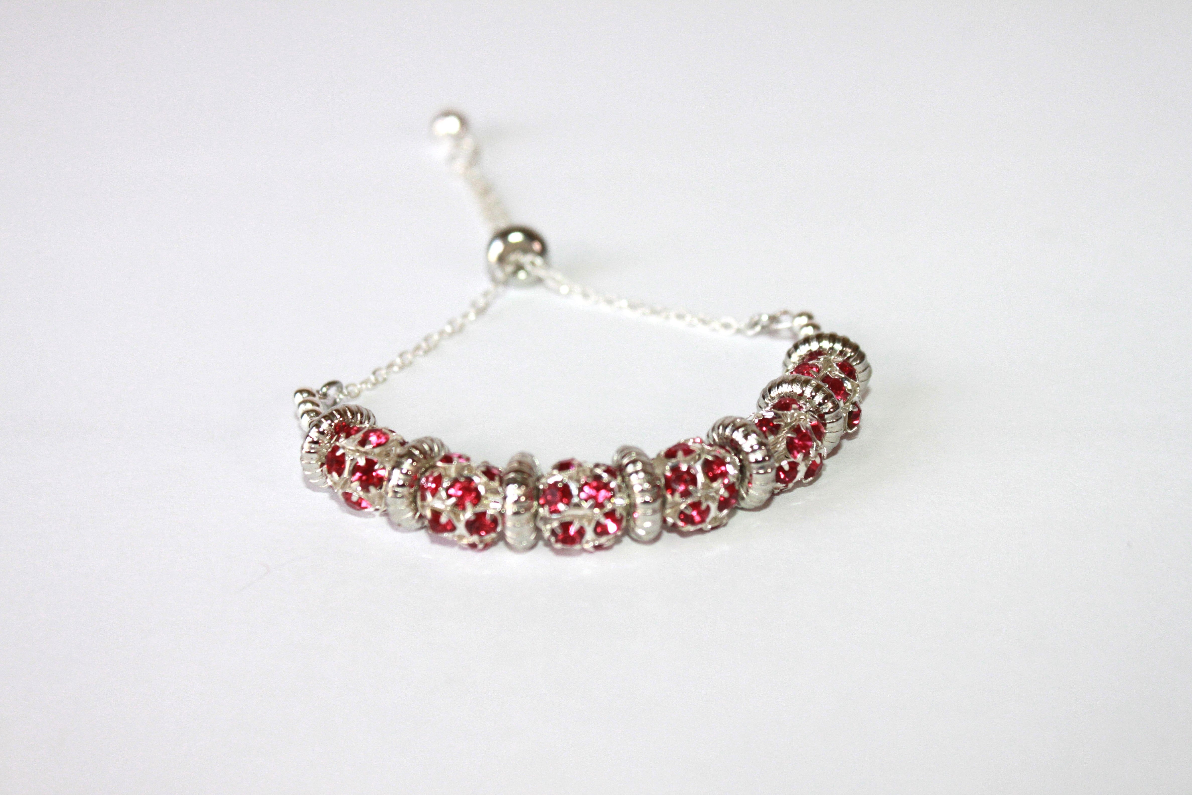 Dark pink stones Hand-crafted stainless steel and crystal adjustable bracelet - Available in various colors.