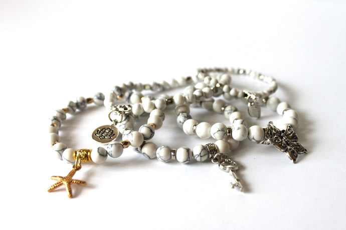 GENUINE Natural Stones/Healing Crystals, hand-crafted bracelets (White Howlite). All bracelets are adorned with silver or gold charms.