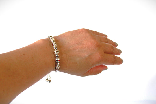 Hand-crafted stainless steel and crystal adjustable bracelet - Available in various colors.