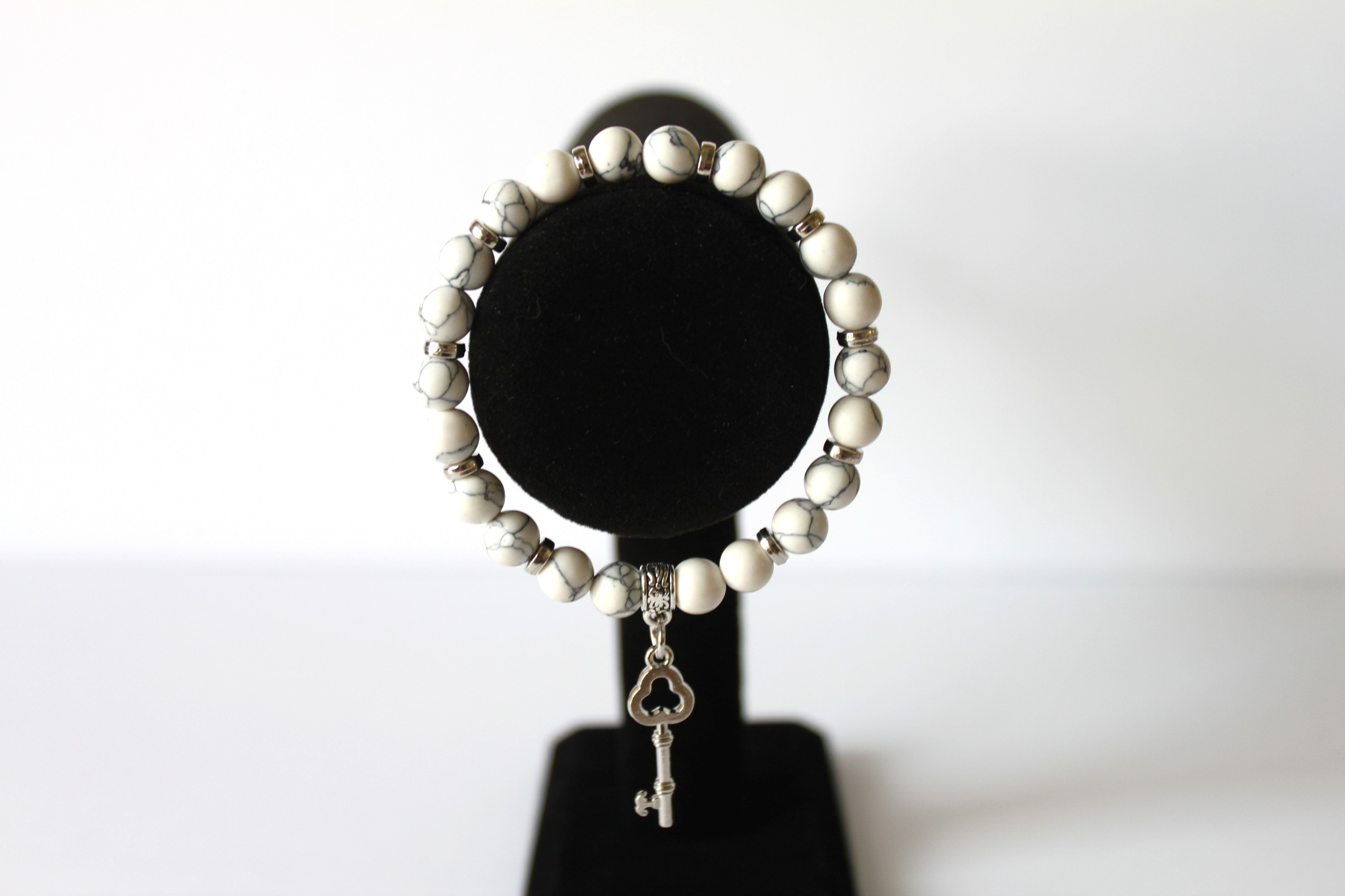 Key 7.5" GENUINE Natural Stones/Healing Crystals, hand-crafted bracelets (White Howlite). All bracelets are adorned with silver or gold charms. BGWB13-5