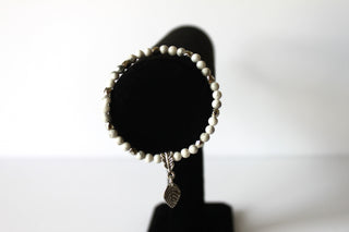 Leaf 7" GENUINE Natural Stones/Healing Crystals, hand-crafted bracelets (White Howlite). All bracelets are adorned with silver or gold charms. BGWB13-2
