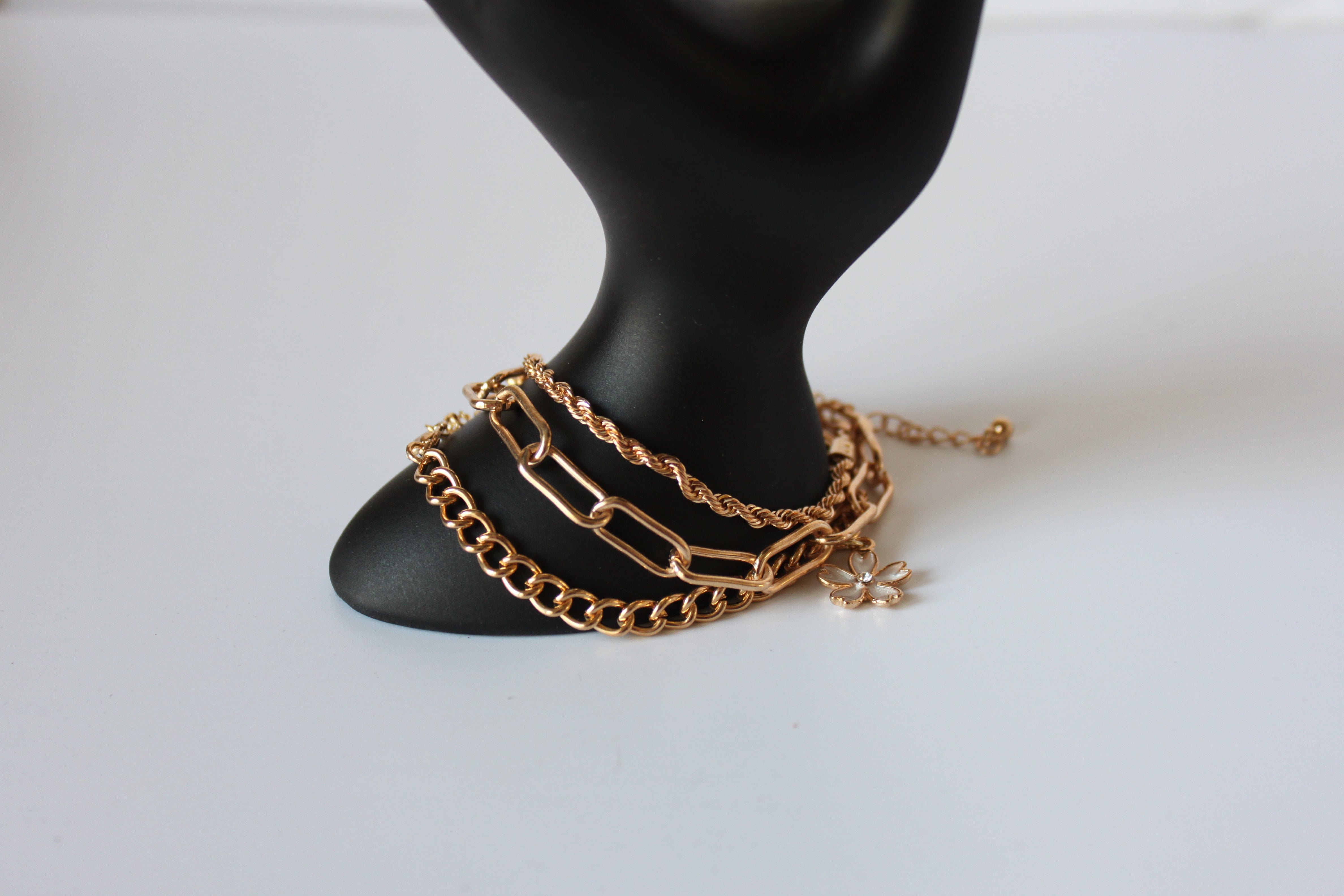 Bracelet - 3 gold bracelets - layer style. Paper clip, rope and cable chain designs w/charms - 6.5" JL066