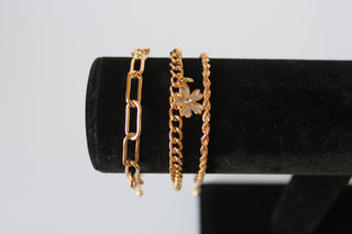 Bracelet - 3 gold bracelets - layer style. Paper clip, rope and cable chain designs w/charms - 6.5" JL066