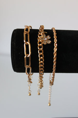 Bracelet - 3 gold bracelets - layer style. Paper clip, rope and cable chain designs w/charms - 6.5" JL066