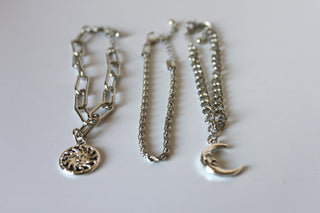Bracelet - 3 silver bracelets - layer style. Paper clip, rope and cable chain designs w/moon & sun charms- 6.5" w/extensions JL068