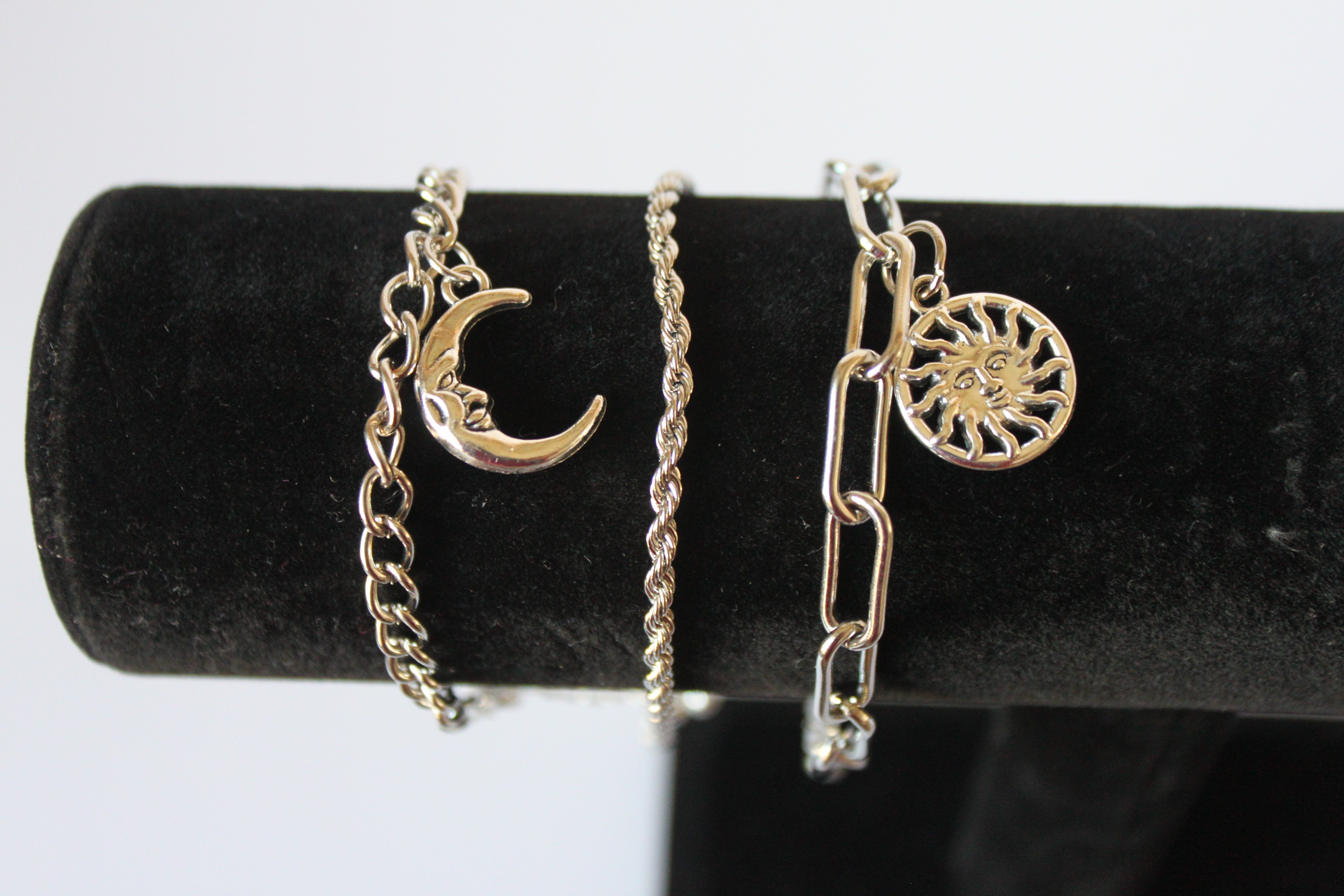 Bracelet - 3 silver bracelets - layer style. Paper clip, rope and cable chain designs w/moon & sun charms- 6.5" w/extensions JL068