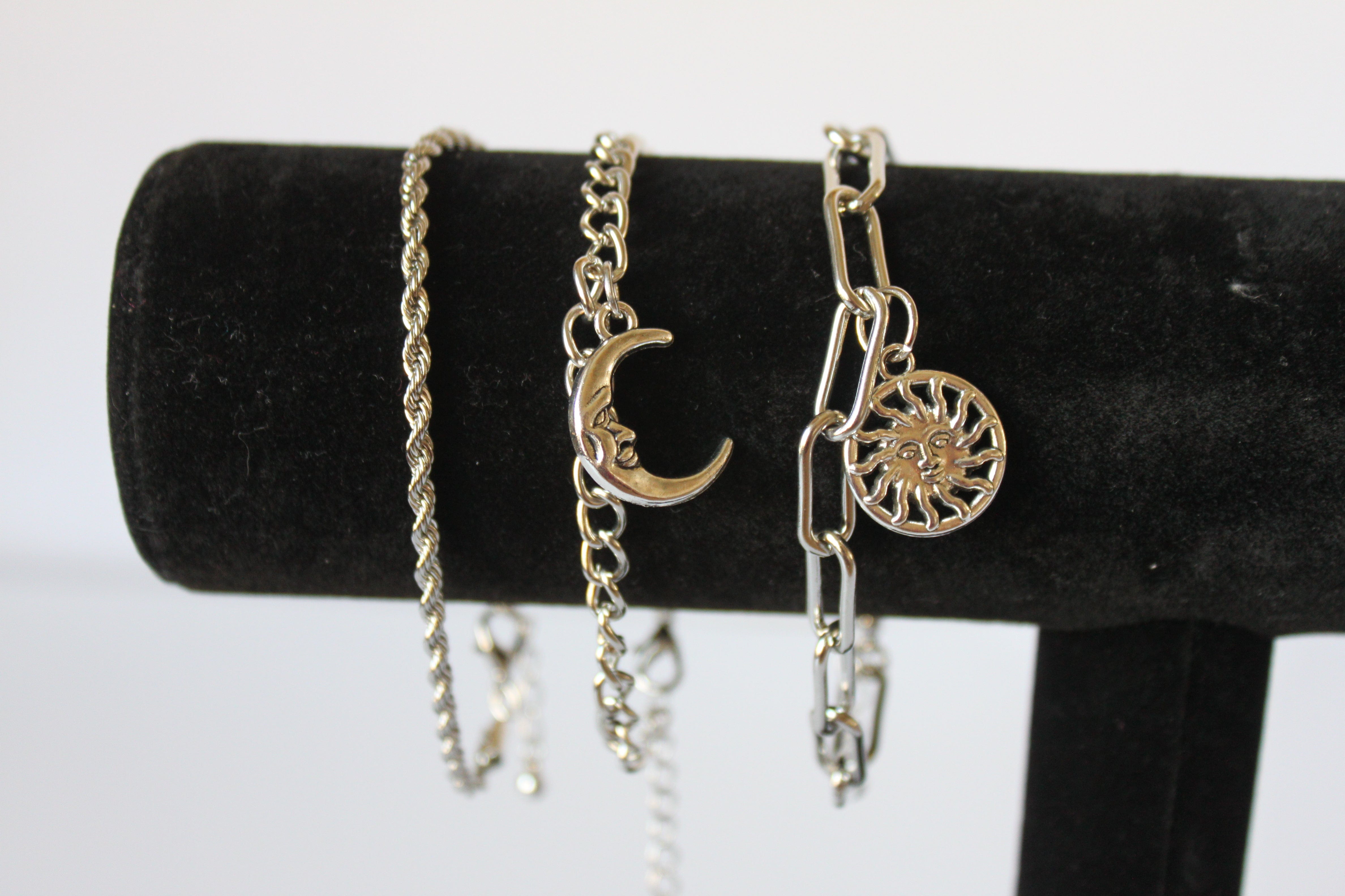 Bracelet - 3 silver bracelets - layer style. Paper clip, rope and cable chain designs w/moon & sun charms- 6.5" w/extensions JL068
