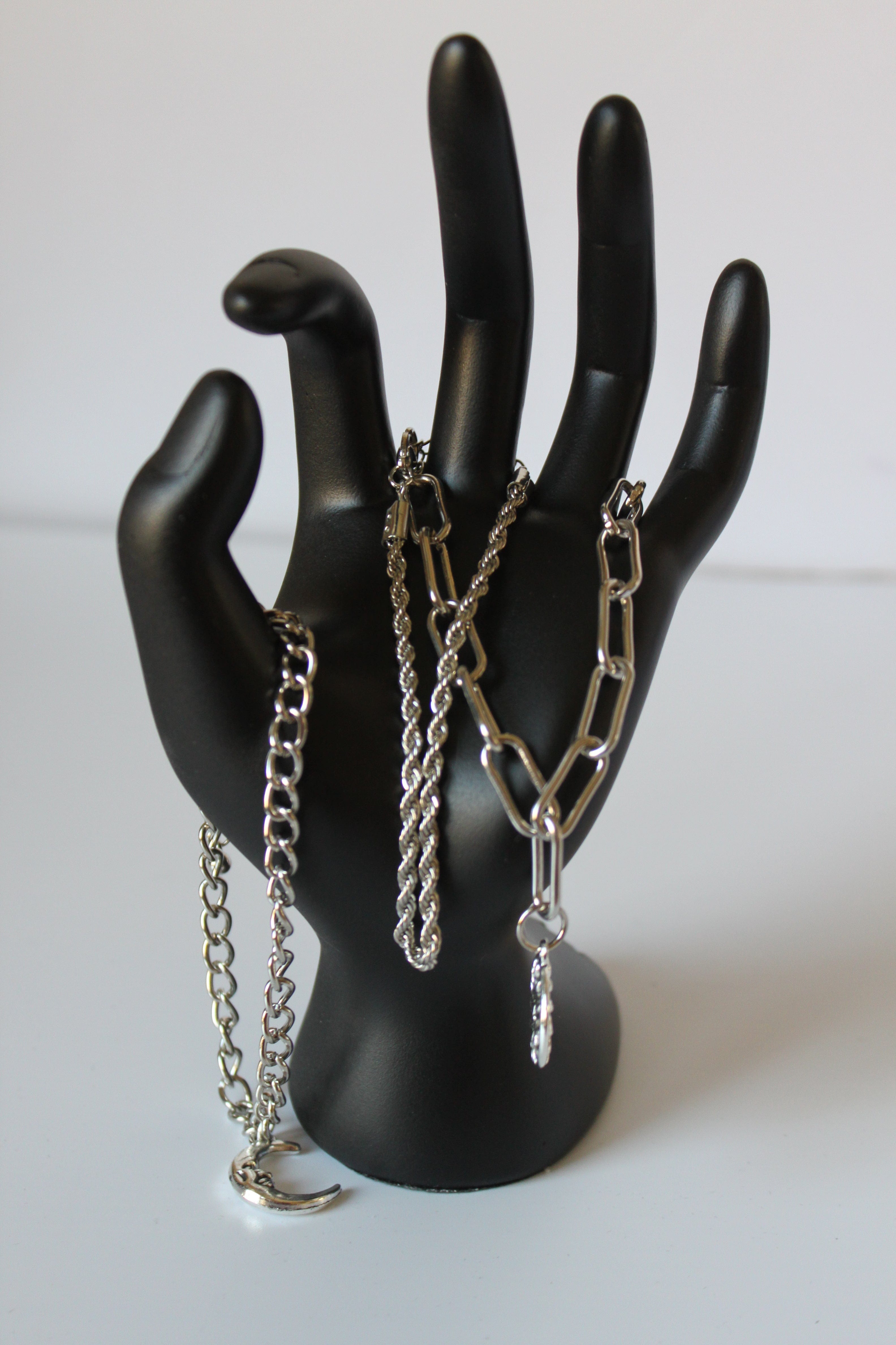 Bracelet - 3 silver bracelets - layer style. Paper clip, rope and cable chain designs w/moon & sun charms- 6.5" w/extensions JL068