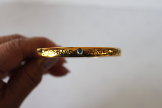 Bracelet - Gold bangle- December inscription with light blue sapphire gemstone JL038