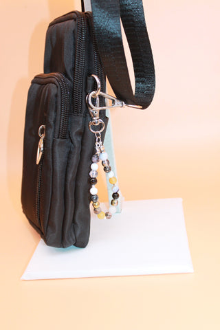 Crossbody Bag - Small black fashion handbag with adjustable strap and pretty bag charm HB055
