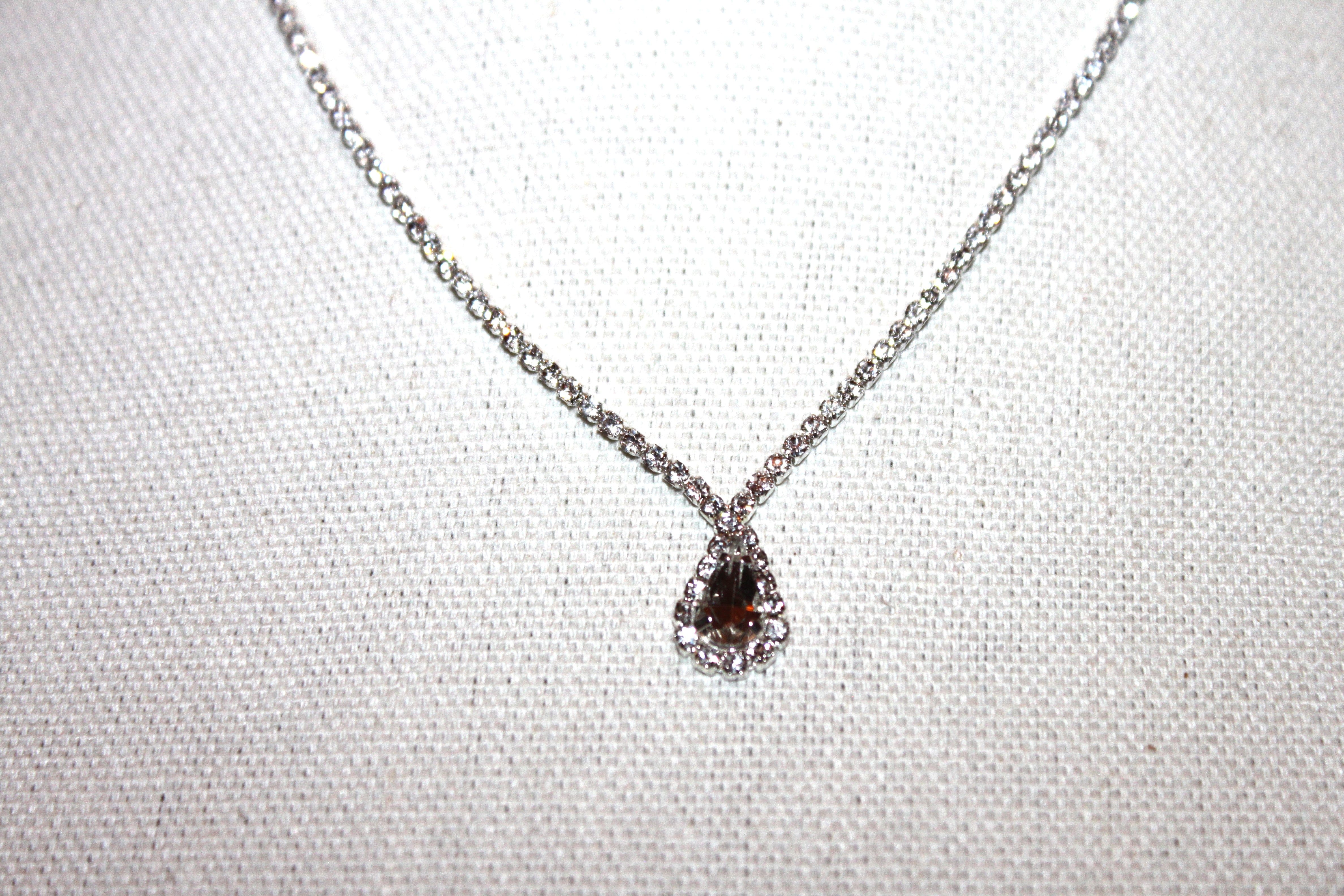 Necklace - Beautiful fashion necklace set in rhinestones and rhinestone pendant - 16" with 2.5" extension JL057