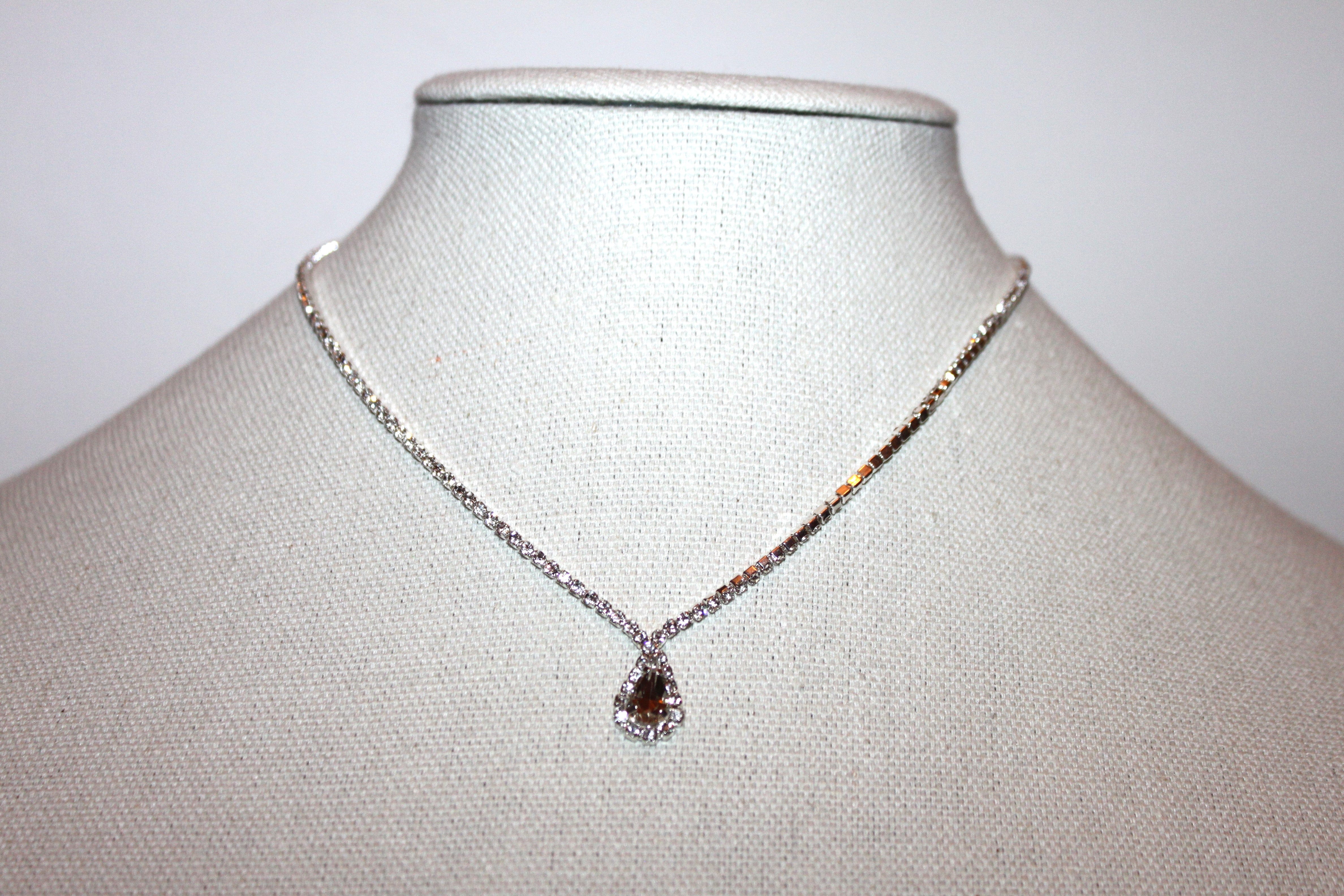 Necklace - Beautiful fashion necklace set in rhinestones and rhinestone pendant - 16" with 2.5" extension JL057